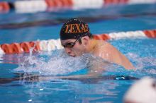 UT sophomore Trey Hoover competed in the 400 yard IM with a time of 4:10.06.  The University of Texas Longhorns defeated The University of Georgia Bulldogs 157-135 on Saturday, January 12, 2008.

Filename: SRM_20080112_1240340.jpg
Aperture: f/2.8
Shutter Speed: 1/400
Body: Canon EOS-1D Mark II
Lens: Canon EF 300mm f/2.8 L IS