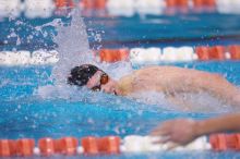 UT sophomore Trey Hoover competed in the 400 yard IM with a time of 4:10.06.  The University of Texas Longhorns defeated The University of Georgia Bulldogs 157-135 on Saturday, January 12, 2008.

Filename: SRM_20080112_1241205.jpg
Aperture: f/2.8
Shutter Speed: 1/400
Body: Canon EOS-1D Mark II
Lens: Canon EF 300mm f/2.8 L IS