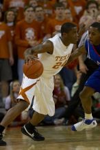 The University of Texas (UT) Longhorns defeated the University of Kansas Jayhawks 72-69 in Austin, Texas on Monday, February 11, 2008.

Filename: SRM_20080211_2024284.jpg
Aperture: f/3.2
Shutter Speed: 1/1000
Body: Canon EOS 20D
Lens: Canon EF 300mm f/2.8 L IS