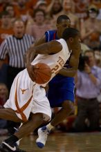 The University of Texas (UT) Longhorns defeated the University of Kansas Jayhawks 72-69 in Austin, Texas on Monday, February 11, 2008.

Filename: SRM_20080211_2024305.jpg
Aperture: f/3.2
Shutter Speed: 1/1000
Body: Canon EOS 20D
Lens: Canon EF 300mm f/2.8 L IS