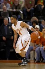 UT junior A.J. Abrams (#3, G) playing defense against a Kansas player.  The University of Texas (UT) Longhorns defeated the University of Kansas Jayhawks 72-69 in Austin, Texas on Monday, February 11, 2008.

Filename: SRM_20080211_2036300.jpg
Aperture: f/2.8
Shutter Speed: 1/640
Body: Canon EOS 20D
Lens: Canon EF 300mm f/2.8 L IS