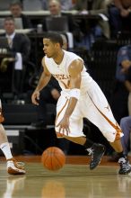 UT junior A.J. Abrams (#3, G) playing defense against a Kansas player.  The University of Texas (UT) Longhorns defeated the University of Kansas Jayhawks 72-69 in Austin, Texas on Monday, February 11, 2008.

Filename: SRM_20080211_2036342.jpg
Aperture: f/2.8
Shutter Speed: 1/640
Body: Canon EOS 20D
Lens: Canon EF 300mm f/2.8 L IS