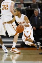 UT junior A.J. Abrams (#3, G) playing defense against a Kansas player.  The University of Texas (UT) Longhorns defeated the University of Kansas Jayhawks 72-69 in Austin, Texas on Monday, February 11, 2008.

Filename: SRM_20080211_2036363.jpg
Aperture: f/2.8
Shutter Speed: 1/640
Body: Canon EOS 20D
Lens: Canon EF 300mm f/2.8 L IS