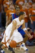 The University of Texas (UT) Longhorns defeated the University of Kansas Jayhawks 72-69 in Austin, Texas on Monday, February 11, 2008.

Filename: SRM_20080211_2043406.jpg
Aperture: f/2.8
Shutter Speed: 1/640
Body: Canon EOS 20D
Lens: Canon EF 300mm f/2.8 L IS