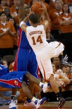 UT junior A.J. Abrams (#3, G) playing defense against a Kansas player.  The University of Texas (UT) Longhorns defeated the University of Kansas Jayhawks 72-69 in Austin, Texas on Monday, February 11, 2008.

Filename: SRM_20080211_2045425.jpg
Aperture: f/2.8
Shutter Speed: 1/640
Body: Canon EOS 20D
Lens: Canon EF 300mm f/2.8 L IS