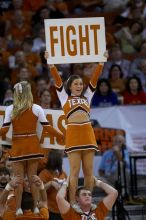 The University of Texas (UT) Longhorns defeated the University of Kansas Jayhawks 72-69 in Austin, Texas on Monday, February 11, 2008.

Filename: SRM_20080211_2052229.jpg
Aperture: f/2.8
Shutter Speed: 1/640
Body: Canon EOS 20D
Lens: Canon EF 300mm f/2.8 L IS