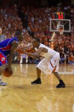 UT junior A.J. Abrams (#3, G) playing defense against a Kansas player.  The University of Texas (UT) Longhorns defeated the University of Kansas Jayhawks 72-69 in Austin, Texas on Monday, February 11, 2008.

Filename: SRM_20080211_2056466.jpg
Aperture: f/2.8
Shutter Speed: 1/640
Body: Canon EOS-1D Mark II
Lens: Canon EF 80-200mm f/2.8 L