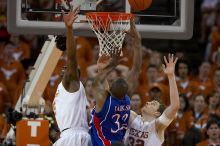 The University of Texas (UT) Longhorns defeated the University of Kansas Jayhawks 72-69 in Austin, Texas on Monday, February 11, 2008.

Filename: SRM_20080211_2118205.jpg
Aperture: f/2.8
Shutter Speed: 1/800
Body: Canon EOS 20D
Lens: Canon EF 300mm f/2.8 L IS