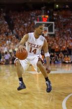 UT junior A.J. Abrams (#3, G) playing defense against a Kansas player.  The University of Texas (UT) Longhorns defeated the University of Kansas Jayhawks 72-69 in Austin, Texas on Monday, February 11, 2008.

Filename: SRM_20080211_2120447.jpg
Aperture: f/2.8
Shutter Speed: 1/640
Body: Canon EOS-1D Mark II
Lens: Canon EF 80-200mm f/2.8 L