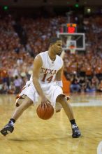 UT junior A.J. Abrams (#3, G) playing defense against a Kansas player.  The University of Texas (UT) Longhorns defeated the University of Kansas Jayhawks 72-69 in Austin, Texas on Monday, February 11, 2008.

Filename: SRM_20080211_2120468.jpg
Aperture: f/2.8
Shutter Speed: 1/640
Body: Canon EOS-1D Mark II
Lens: Canon EF 80-200mm f/2.8 L