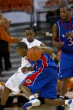 UT junior A.J. Abrams (#3, G) defends KU senior Rodrick Stewart (#5, Guard).  The University of Texas (UT) Longhorns defeated the University of Kansas Jayhawks 72-69 in Austin, Texas on Monday, February 11, 2008.

Filename: SRM_20080211_2122303.jpg
Aperture: f/2.8
Shutter Speed: 1/800
Body: Canon EOS 20D
Lens: Canon EF 300mm f/2.8 L IS