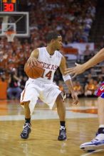 UT junior A.J. Abrams (#3, G) playing defense against a Kansas player.  The University of Texas (UT) Longhorns defeated the University of Kansas Jayhawks 72-69 in Austin, Texas on Monday, February 11, 2008.

Filename: SRM_20080211_2123548.jpg
Aperture: f/2.8
Shutter Speed: 1/640
Body: Canon EOS-1D Mark II
Lens: Canon EF 80-200mm f/2.8 L