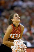 The University of Texas (UT) Longhorns defeated the University of Kansas Jayhawks 72-69 in Austin, Texas on Monday, February 11, 2008.

Filename: SRM_20080211_2126460.jpg
Aperture: f/2.8
Shutter Speed: 1/640
Body: Canon EOS 20D
Lens: Canon EF 300mm f/2.8 L IS