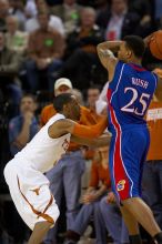 The University of Texas (UT) Longhorns defeated the University of Kansas Jayhawks 72-69 in Austin, Texas on Monday, February 11, 2008.

Filename: SRM_20080211_2129462.jpg
Aperture: f/2.8
Shutter Speed: 1/640
Body: Canon EOS 20D
Lens: Canon EF 300mm f/2.8 L IS