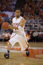 UT junior A.J. Abrams (#3, G) playing defense against a Kansas player.  The University of Texas (UT) Longhorns defeated the University of Kansas Jayhawks 72-69 in Austin, Texas on Monday, February 11, 2008.

Filename: SRM_20080211_2133169.jpg
Aperture: f/2.8
Shutter Speed: 1/640
Body: Canon EOS-1D Mark II
Lens: Canon EF 80-200mm f/2.8 L