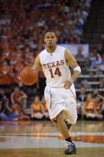 UT junior A.J. Abrams (#3, G) playing defense against a Kansas player.  The University of Texas (UT) Longhorns defeated the University of Kansas Jayhawks 72-69 in Austin, Texas on Monday, February 11, 2008.

Filename: SRM_20080211_2134081.jpg
Aperture: f/2.8
Shutter Speed: 1/640
Body: Canon EOS-1D Mark II
Lens: Canon EF 80-200mm f/2.8 L