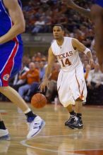 UT junior A.J. Abrams (#3, G) playing defense against a Kansas player.  The University of Texas (UT) Longhorns defeated the University of Kansas Jayhawks 72-69 in Austin, Texas on Monday, February 11, 2008.

Filename: SRM_20080211_2134125.jpg
Aperture: f/2.8
Shutter Speed: 1/640
Body: Canon EOS-1D Mark II
Lens: Canon EF 80-200mm f/2.8 L