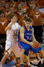 The University of Texas (UT) Longhorns defeated the University of Kansas Jayhawks 72-69 in Austin, Texas on Monday, February 11, 2008.

Filename: SRM_20080211_2134324.jpg
Aperture: f/2.8
Shutter Speed: 1/800
Body: Canon EOS 20D
Lens: Canon EF 300mm f/2.8 L IS