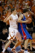 The University of Texas (UT) Longhorns defeated the University of Kansas Jayhawks 72-69 in Austin, Texas on Monday, February 11, 2008.

Filename: SRM_20080211_2134345.jpg
Aperture: f/2.8
Shutter Speed: 1/800
Body: Canon EOS 20D
Lens: Canon EF 300mm f/2.8 L IS