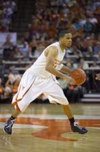 UT junior A.J. Abrams (#3, G) playing defense against a Kansas player.  The University of Texas (UT) Longhorns defeated the University of Kansas Jayhawks 72-69 in Austin, Texas on Monday, February 11, 2008.

Filename: SRM_20080211_2135021.jpg
Aperture: f/2.8
Shutter Speed: 1/640
Body: Canon EOS-1D Mark II
Lens: Canon EF 80-200mm f/2.8 L