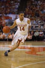 UT sophomore D.J. Augustin (#14, G) makes a drive.  The University of Texas (UT) Longhorns defeated the University of Kansas Jayhawks 72-69 in Austin, Texas on Monday, February 11, 2008.

Filename: SRM_20080211_2135044.jpg
Aperture: f/2.8
Shutter Speed: 1/640
Body: Canon EOS-1D Mark II
Lens: Canon EF 80-200mm f/2.8 L