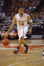 UT junior A.J. Abrams (#3, G) playing defense against a Kansas player.  The University of Texas (UT) Longhorns defeated the University of Kansas Jayhawks 72-69 in Austin, Texas on Monday, February 11, 2008.

Filename: SRM_20080211_2142208.jpg
Aperture: f/2.8
Shutter Speed: 1/640
Body: Canon EOS-1D Mark II
Lens: Canon EF 80-200mm f/2.8 L