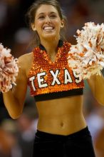 The University of Texas (UT) Longhorns defeated the University of Kansas Jayhawks 72-69 in Austin, Texas on Monday, February 11, 2008.

Filename: SRM_20080211_2148386.jpg
Aperture: f/2.8
Shutter Speed: 1/640
Body: Canon EOS 20D
Lens: Canon EF 300mm f/2.8 L IS