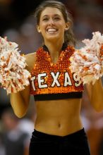 The University of Texas (UT) Longhorns defeated the University of Kansas Jayhawks 72-69 in Austin, Texas on Monday, February 11, 2008.

Filename: SRM_20080211_2148428.jpg
Aperture: f/2.8
Shutter Speed: 1/640
Body: Canon EOS 20D
Lens: Canon EF 300mm f/2.8 L IS