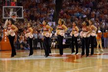 Texas Pom.  The University of Texas (UT) Longhorns defeated the University of Kansas Jayhawks 72-69 in Austin, Texas on Monday, February 11, 2008.

Filename: SRM_20080211_2148528.jpg
Aperture: f/2.8
Shutter Speed: 1/640
Body: Canon EOS-1D Mark II
Lens: Canon EF 80-200mm f/2.8 L