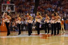 Texas Pom.  The University of Texas (UT) Longhorns defeated the University of Kansas Jayhawks 72-69 in Austin, Texas on Monday, February 11, 2008.

Filename: SRM_20080211_2148528.jpg
Aperture: f/2.8
Shutter Speed: 1/640
Body: Canon EOS-1D Mark II
Lens: Canon EF 80-200mm f/2.8 L