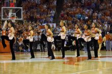 Texas Pom.  The University of Texas (UT) Longhorns defeated the University of Kansas Jayhawks 72-69 in Austin, Texas on Monday, February 11, 2008.

Filename: SRM_20080211_2148540.jpg
Aperture: f/2.8
Shutter Speed: 1/640
Body: Canon EOS-1D Mark II
Lens: Canon EF 80-200mm f/2.8 L