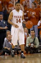 UT junior A.J. Abrams (#3, G) playing defense against a Kansas player.  The University of Texas (UT) Longhorns defeated the University of Kansas Jayhawks 72-69 in Austin, Texas on Monday, February 11, 2008.

Filename: SRM_20080211_2153249.jpg
Aperture: f/2.8
Shutter Speed: 1/640
Body: Canon EOS 20D
Lens: Canon EF 300mm f/2.8 L IS