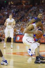 UT junior A.J. Abrams (#3, G) playing defense against a Kansas player.  The University of Texas (UT) Longhorns defeated the University of Kansas Jayhawks 72-69 in Austin, Texas on Monday, February 11, 2008.

Filename: SRM_20080211_2153266.jpg
Aperture: f/2.8
Shutter Speed: 1/640
Body: Canon EOS-1D Mark II
Lens: Canon EF 80-200mm f/2.8 L