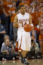 UT junior A.J. Abrams (#3, G) playing defense against a Kansas player.  The University of Texas (UT) Longhorns defeated the University of Kansas Jayhawks 72-69 in Austin, Texas on Monday, February 11, 2008.

Filename: SRM_20080211_2153281.jpg
Aperture: f/2.8
Shutter Speed: 1/640
Body: Canon EOS 20D
Lens: Canon EF 300mm f/2.8 L IS