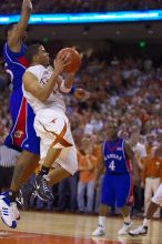 UT sophomore D.J. Augustin (#14, G) takes a shot with KU senior Rodrick Stewart (#5, Guard) on his back.  The University of Texas (UT) Longhorns defeated the University of Kansas Jayhawks 72-69 in Austin, Texas on Monday, February 11, 2008.

Filename: SRM_20080211_2153289.jpg
Aperture: f/2.8
Shutter Speed: 1/640
Body: Canon EOS-1D Mark II
Lens: Canon EF 80-200mm f/2.8 L