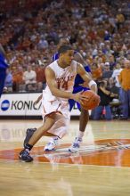 UT junior A.J. Abrams (#3, G) playing defense against a Kansas player.  The University of Texas (UT) Longhorns defeated the University of Kansas Jayhawks 72-69 in Austin, Texas on Monday, February 11, 2008.

Filename: SRM_20080211_2158204.jpg
Aperture: f/2.8
Shutter Speed: 1/640
Body: Canon EOS-1D Mark II
Lens: Canon EF 80-200mm f/2.8 L