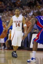 UT junior A.J. Abrams (#3, G) playing defense against a Kansas player.  The University of Texas (UT) Longhorns defeated the University of Kansas Jayhawks 72-69 in Austin, Texas on Monday, February 11, 2008.

Filename: SRM_20080211_2206269.jpg
Aperture: f/2.8
Shutter Speed: 1/640
Body: Canon EOS-1D Mark II
Lens: Canon EF 80-200mm f/2.8 L