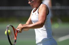 Fifth singles UT freshman Caroline Larsson defeated CSUS sophomore Aileen Tsan 6-2, 6-4.  The University of Texas defeated Sacramento State on Saturday, March 22, 2008.

Filename: SRM_20080322_1238560.jpg
Aperture: f/2.8
Shutter Speed: 1/4000
Body: Canon EOS-1D Mark II
Lens: Canon EF 300mm f/2.8 L IS