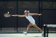 Fifth singles UT freshman Caroline Larsson defeated CSUS sophomore Aileen Tsan 6-2, 6-4.  The University of Texas defeated Sacramento State on Saturday, March 22, 2008.

Filename: SRM_20080322_1243520.jpg
Aperture: f/2.8
Shutter Speed: 1/2000
Body: Canon EOS-1D Mark II
Lens: Canon EF 300mm f/2.8 L IS