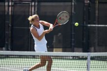 Fifth singles UT freshman Caroline Larsson defeated CSUS sophomore Aileen Tsan 6-2, 6-4.  The University of Texas defeated Sacramento State on Saturday, March 22, 2008.

Filename: SRM_20080322_1244006.jpg
Aperture: f/2.8
Shutter Speed: 1/2000
Body: Canon EOS-1D Mark II
Lens: Canon EF 300mm f/2.8 L IS