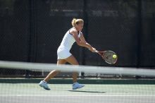 Fifth singles UT freshman Caroline Larsson defeated CSUS sophomore Aileen Tsan 6-2, 6-4.  The University of Texas defeated Sacramento State on Saturday, March 22, 2008.

Filename: SRM_20080322_1245301.jpg
Aperture: f/2.8
Shutter Speed: 1/2000
Body: Canon EOS-1D Mark II
Lens: Canon EF 300mm f/2.8 L IS