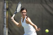 Fourth singles UT freshman Maggie Mello lost to CSUS junior Karina Jarlkaganova 6-7 (2), 4-6.  The University of Texas defeated Sacramento State on Saturday, March 22, 2008.

Filename: SRM_20080322_1253587.jpg
Aperture: f/2.8
Shutter Speed: 1/2500
Body: Canon EOS-1D Mark II
Lens: Canon EF 300mm f/2.8 L IS