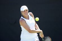 Second singles UT senior Courtney Zauft defeated CSUS junior Anastassia Lyssenko 4-6, 6-3, 10-6.  The University of Texas defeated Sacramento State on Saturday, March 22, 2008.

Filename: SRM_20080322_1306261.jpg
Aperture: f/2.8
Shutter Speed: 1/2000
Body: Canon EOS-1D Mark II
Lens: Canon EF 300mm f/2.8 L IS