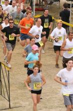 Beth Marek running The Saint trail race, sponsored by Rogue, at the Saint Stephen's Episcopal School on Sunday morning, June 29, 2008.

Filename: SRM_20080629_0731145.jpg
Aperture: f/4.0
Shutter Speed: 1/250
Body: Canon EOS 20D
Lens: Canon EF 80-200mm f/2.8 L