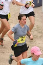 Beth Marek running The Saint trail race, sponsored by Rogue, at the Saint Stephen's Episcopal School on Sunday morning, June 29, 2008.

Filename: SRM_20080629_0731167.jpg
Aperture: f/4.0
Shutter Speed: 1/250
Body: Canon EOS 20D
Lens: Canon EF 80-200mm f/2.8 L