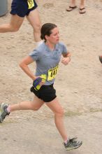 Beth Marek running The Saint trail race, sponsored by Rogue, at the Saint Stephen's Episcopal School on Sunday morning, June 29, 2008.

Filename: SRM_20080629_0731221.jpg
Aperture: f/4.0
Shutter Speed: 1/250
Body: Canon EOS 20D
Lens: Canon EF 80-200mm f/2.8 L