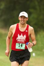 Paul Terranova  placed second overall in The Saint 30K trail race, sponsored by Rogue, at the Saint Stephen's Episcopal School on Sunday morning, June 29, 2008.

Filename: SRM_20080629_0909200.jpg
Aperture: f/4.0
Shutter Speed: 1/250
Body: Canon EOS 20D
Lens: Canon EF 300mm f/2.8 L IS