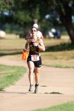 Mandy Olivares (bib #32) of Austin placed 1 in her age group (F 30-34) with an overall time of 01:33:28 at The Howdy Du duathlon in Berry Springs Park, Georgetown, Sunday July 6, 2008.

Filename: SRM_20080706_0854087.jpg
Aperture: f/4.0
Shutter Speed: 1/500
Body: Canon EOS 20D
Lens: Canon EF 300mm f/2.8 L IS