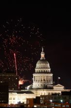 Austin Independence Day fireworks with the Capitol building, as viewed from atop the Manor Garage at The University of Texas at Austin.  The fireworks were launched from Auditorium Shores, downtown Austin, Friday, July 4, 2008.

Filename: SRM_20080704_2137480.jpg
Aperture: f/11.0
Shutter Speed: 10/1
Body: Canon EOS 20D
Lens: Canon EF 80-200mm f/2.8 L