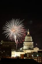 Austin Independence Day fireworks with the Capitol building, as viewed from atop the Manor Garage at The University of Texas at Austin.  The fireworks were launched from Auditorium Shores, downtown Austin, Friday, July 4, 2008.

Filename: SRM_20080704_2138382.jpg
Aperture: f/11.0
Shutter Speed: 10/1
Body: Canon EOS 20D
Lens: Canon EF 80-200mm f/2.8 L